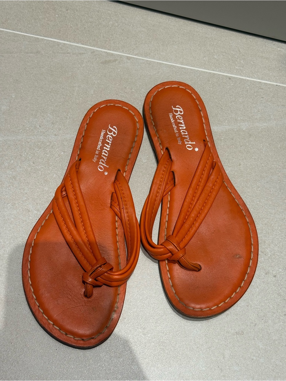Bernardo Orange Leather Knotted Toe-Loop Sandals